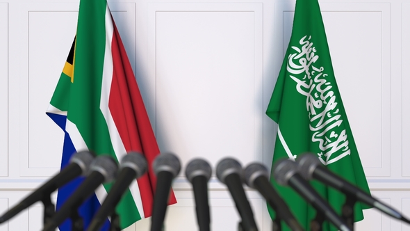 Flags of South Africa and Saudi Arabia at International Press Conference alt