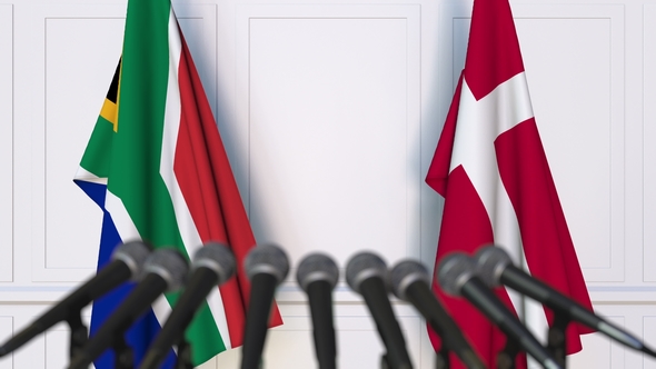 Flags of South Africa and Denmark at International Press Conference alt
