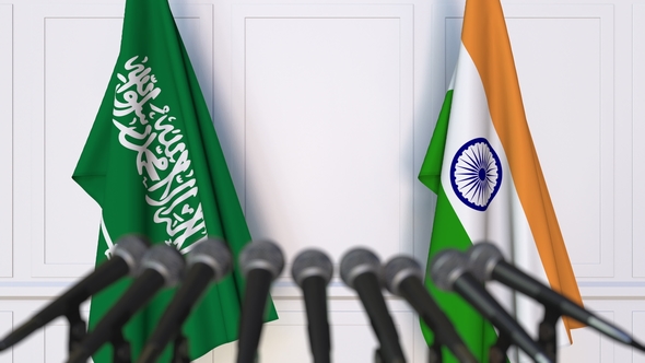 Flags of Saudi Arabia and India at International Press Conference alt