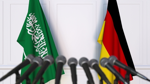 Flags of Saudi Arabia and Germany at International Press Conference alt