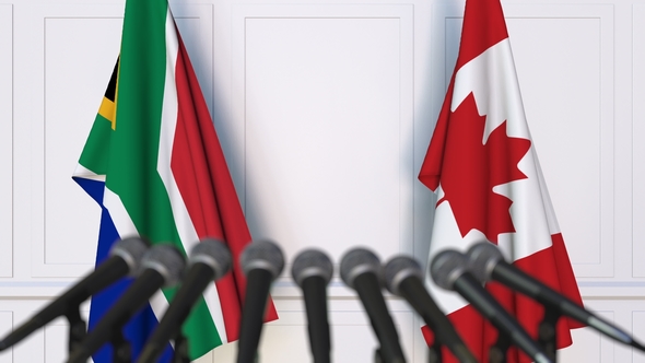 Flags of South Africa and Canada at International Press Conference alt