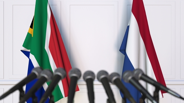Flags of South Africa and Netherlands at International Press Conference alt