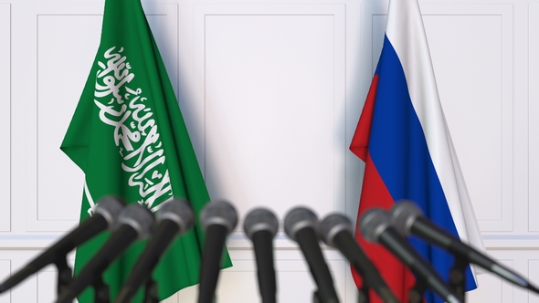 Flags of Saudi Arabia and Russia at International Press Conference alt