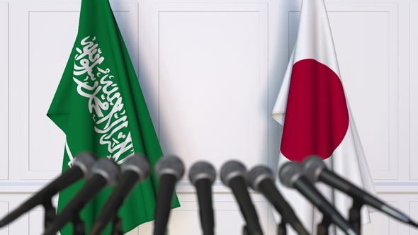 Flags of Saudi Arabia and Japan at International Press Conference alt