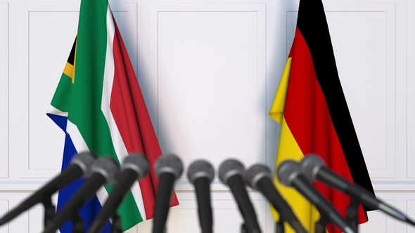Flags of South Africa and Germany at International Press Conference alt