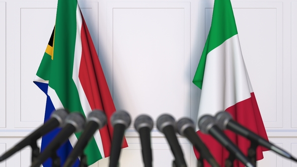 Flags of South Africa and Italy at International Press Conference alt