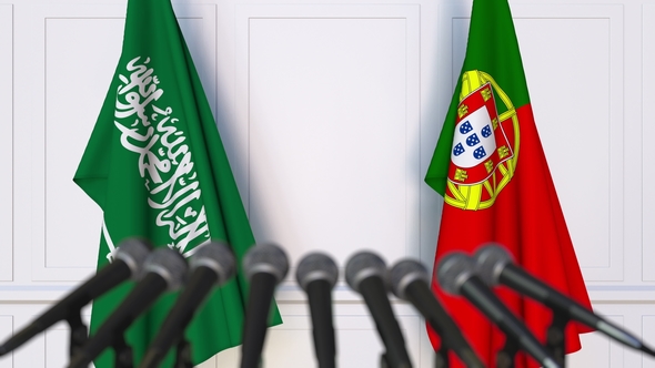 Flags of Saudi Arabia and Portugal at International Press Conference alt