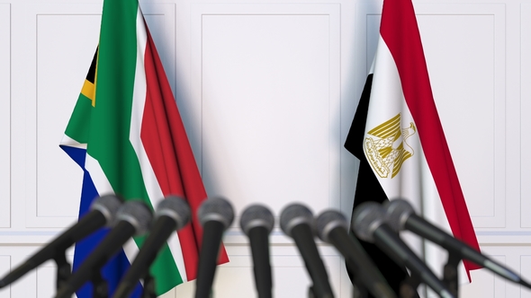 Flags of South Africa and Egypt at International Press Conference alt