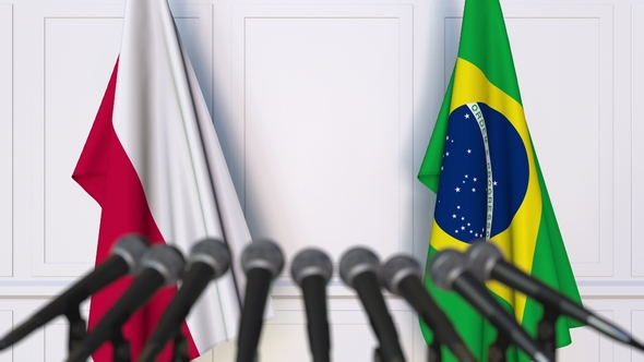 Flags of Poland and Brazil at International Press Conference alt