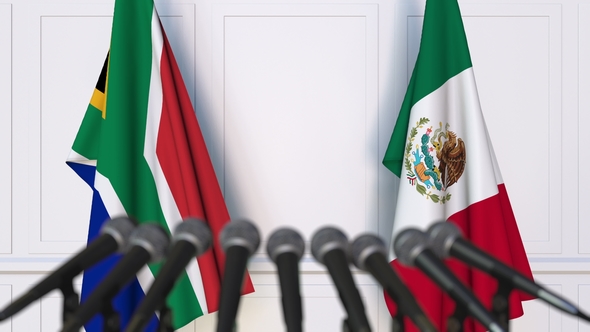Flags of South Africa and Mexico at International Press Conference alt