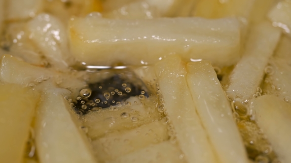 Potatoes Sliced Fried in a Pan