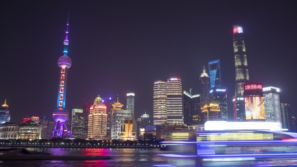 Illuminated Shanghai Skyline. Lujiazui Financial District and Huangpu River. China