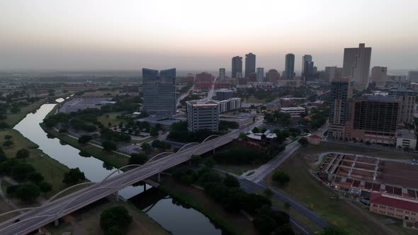 Fort Worth TX USA skyline at dawn. Texas city in DFW region. Trinity River and Park, bridge, downtow