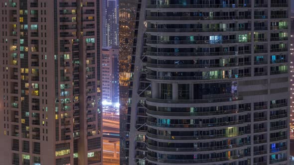 Residential and Office Buildings in Jumeirah Lake Towers District Night Timelapse in Dubai