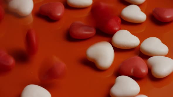 Rotating stock footage shot of Valentines decorations and candies - VALENTINES 0064