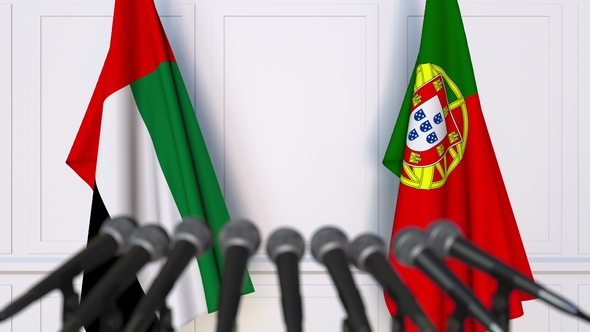 Flags of the UAE and Portugal at International Press Conference alt