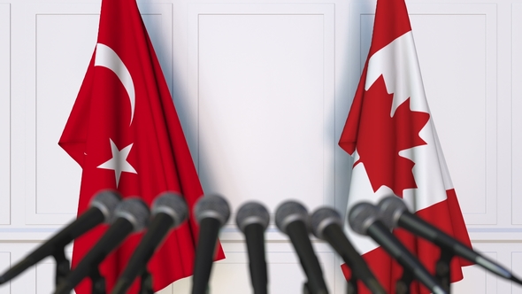 Flags of Turkey and Canada at International Press Conference alt