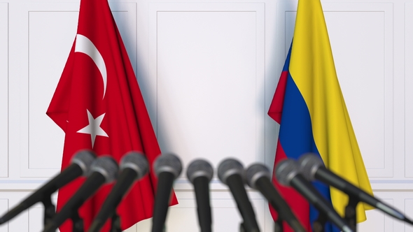 Flags of Turkey and Colombia at International Press Conference alt