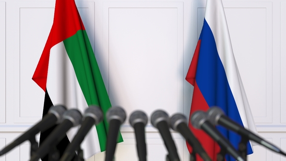 Flags of the UAE and Russia at International Press Conference alt
