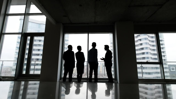 Business Team of Managers Standing Talk in Office