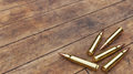 Rifle Ammunition on Old Wooden Boards - PhotoDune Item for Sale