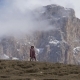 Woman in a Poncho Near a Big Cliff - VideoHive Item for Sale