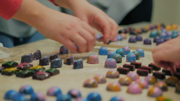 Set of Colorful Luxury Handmade Bonbons on White Table. Exclusive Handcrafted Chocolate Candy