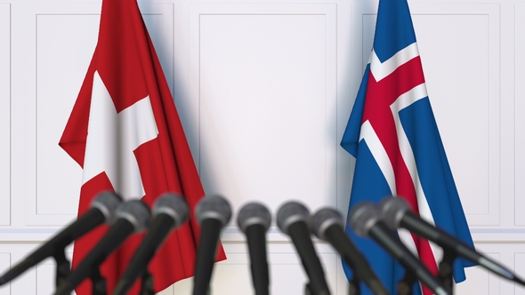 Flags of Switzerland and Iceland at International Press Conference alt