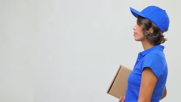 Happy Delivery Girl with Parcel Box in Blue