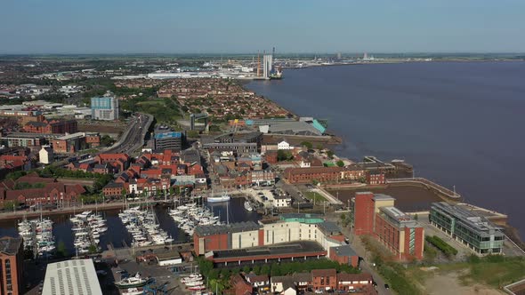 Sunny slow aerial pan from right to left to reveal Hull Marina and the City Centre