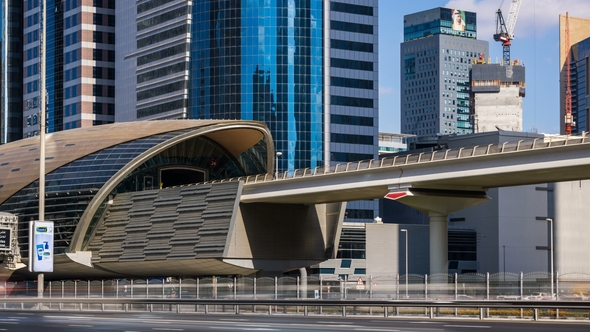 View of Metro Station with Passing Train By Day, Dubai, UAE