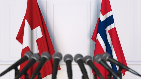 Flags of Switzerland and Norway at International Press Conference alt