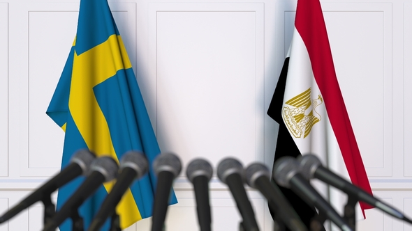 Flags of Sweden and Egypt at International Press Conference alt