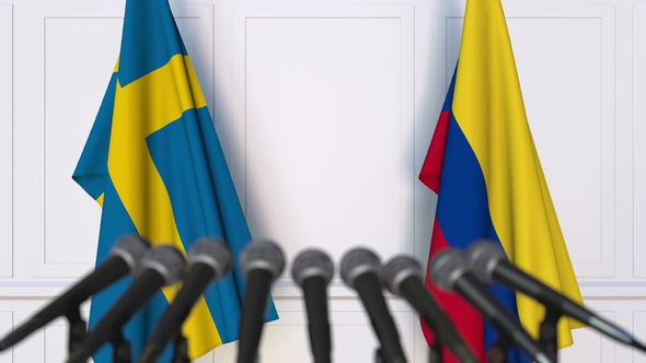 Flags of Sweden and Colombia at International Press Conference alt