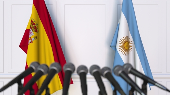 Flags of Spain and Argentina at International Press Conference alt