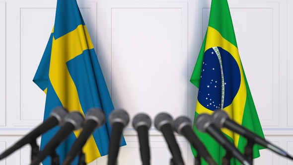 Flags of Sweden and Brazil at International Press Conference alt
