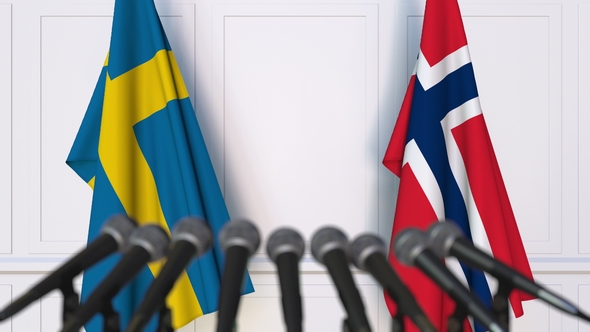 Flags of Sweden and Norway at International Press Conference alt