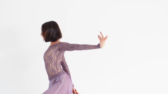 Young Woman in a Purple Dress Dancing Modern Contemporary Style