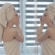 Young, Pretty Woman with Towel on Head and Body Paints Her Eyes in Bathroom. Beauty and Makeup - VideoHive Item for Sale