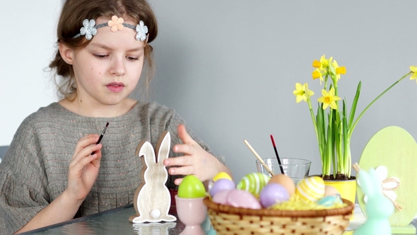 Sweet Girl Paints the Easter Bunny