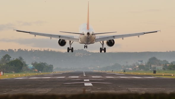 Landing Aircraft at the Airport of the City of Legazpi Early in the Morning