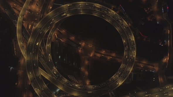Spiral Illuminated Elevated Nanpu Highway at Night. Shanghai, China. Aerial Vertical View