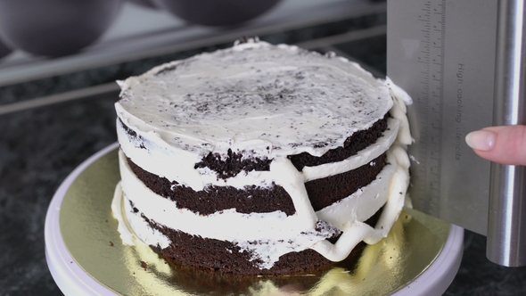 Confectioner Decorates Chocolate Cake