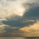Sunset Through the Rainy Clouds Over Ocean. . - VideoHive Item for Sale