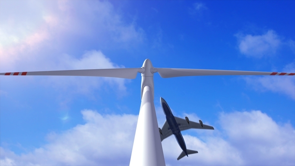 Wind Generator on a Background of a Sky and Plane