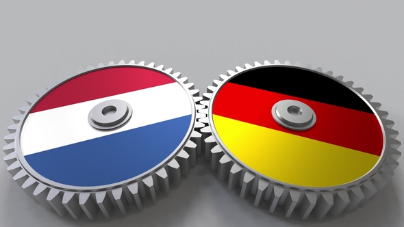 Flags of the Netherlands and Germany on Meshing Gears alt