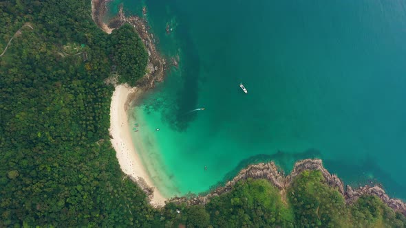 Aerial View of Beach Turquoise Sea Tropical Forest White Sand and Clear Water