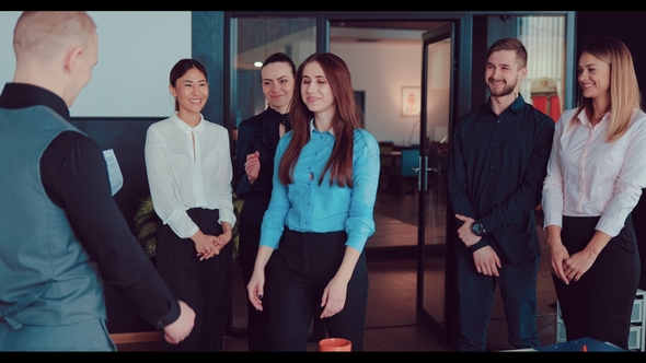 Company Boss Handshaking Promoting Manager While Colleagues Applaud, Businessman Congratulates Woman