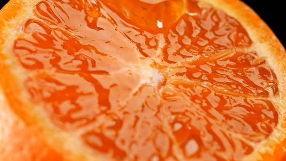 Juicy, Refreshing Tangerine in the Context of Which the Honey Flows Slowly Rotates,