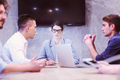 Startup Business Team At A Meeting at modern office building - PhotoDune Item for Sale